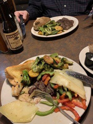 Sirloin steaks, mine was covered with peppers & cheese.