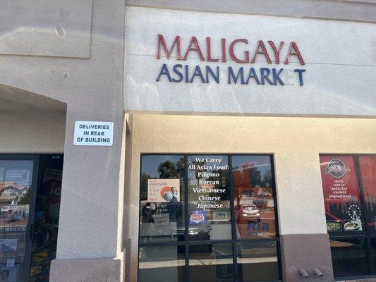 Front of market , fronting Craig Road. Enlarge picture claims to carry those ethnic foods on front glass  door