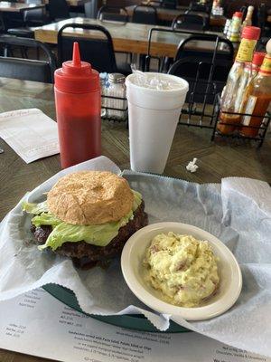 Big cheese showing size of burger to the bun!