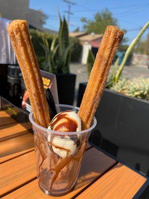 Caramel filled churros and vanilla bean ice cream.