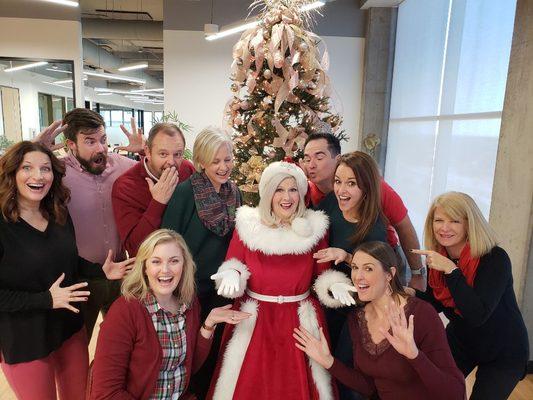 Mrs Claus visits with some  realtors on the nice list.