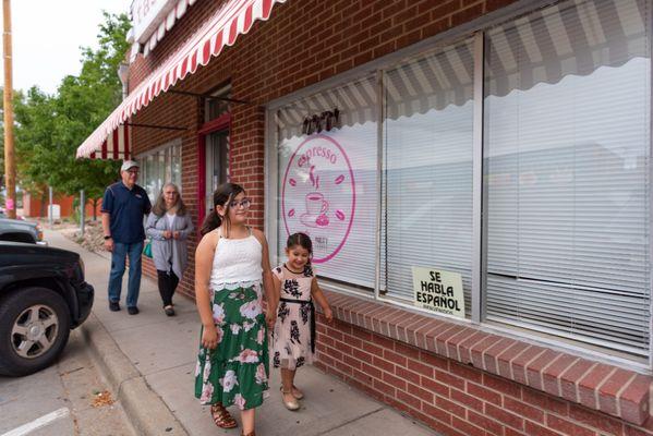 Image of a family walking in Downtown Derby in the City of Commerce City