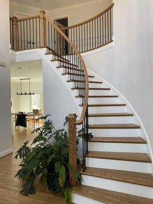 New newel posts, handrails, and balusters, and replaced bottom tread and 1 other tread...LOVE IT!