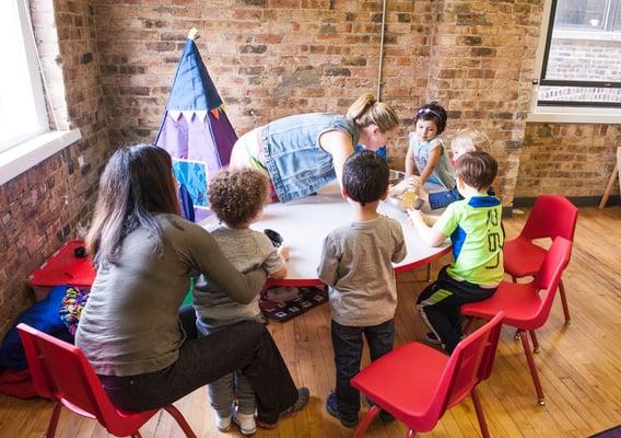 Occupational therapist, Christine Deloria, and speech therapist, Rachel Myatt, running a playgroup at Lumiere Children's Therapy.