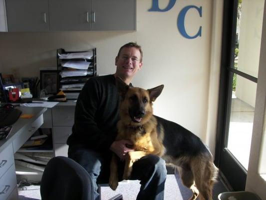 Dr. Cotton with his dog Lexi.