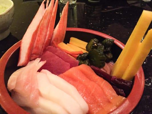 Chirashi: Salmon, Tuna, White Tuna, Red Snapper?, Tamago, Imitation Crab, and Japanese Pickles over sushi rice.