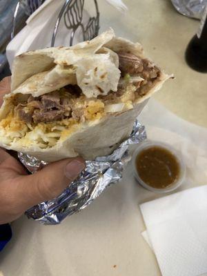 Carnitas super burrito with chicharrones