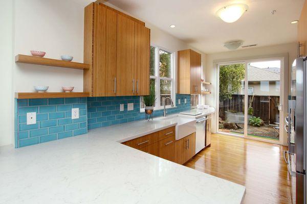 Updated Kitchen with Fireclay tile, custom cabinets, and bamboo floors