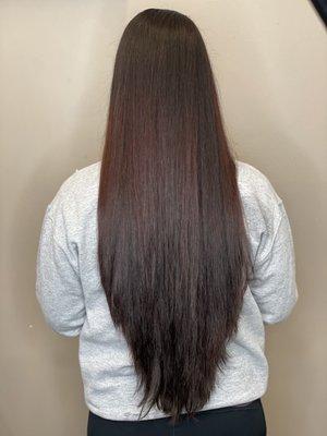 Previous Salon results for a natural partial lowlight with a haircut of a 1 inch trim, keeping the V shape, and layering.