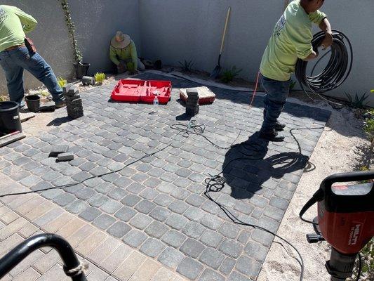 Courtyard being worked on, pavers installed