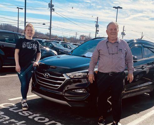 Sales Associate John Murphy is proud to have helped Sami buy her first car!