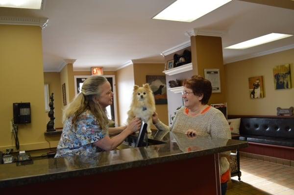 Teri greeting a client.