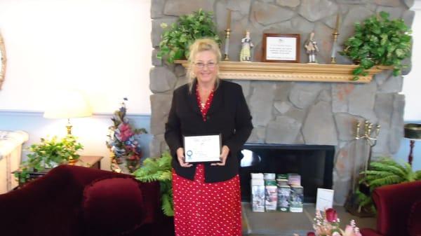 Proudly serving DeSoto and Hardee County, voted the best Funeral Home.
 Allyson Ponger Christ, President receiving the award.