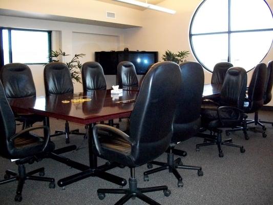 Third floor boardroom style conference room. Seats 14-36 people.