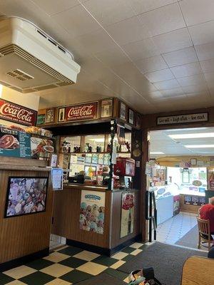 CocaCola memorabilia and deli signage...clean and busy for lunch