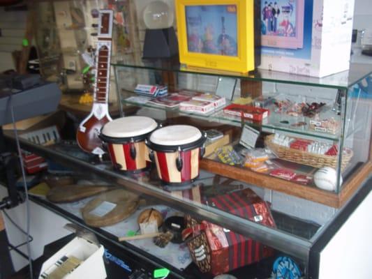 Accordion,concertina,baby sitar,collector Beatle yellow submarine,handmade African instruments, if it's weird we have it or WANT IT we buy$