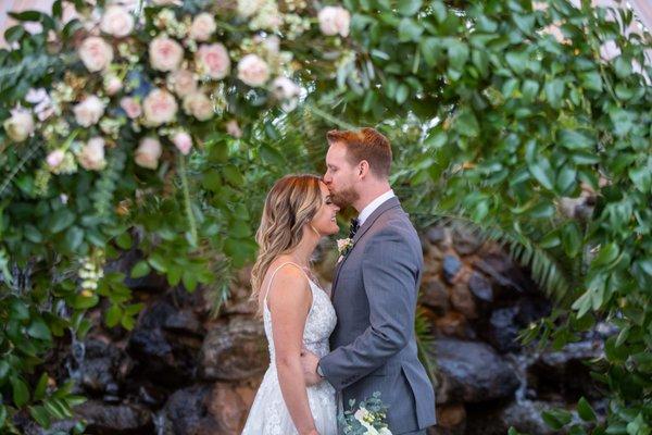 Newlyweds enjoying a romantic moment in the courtyard