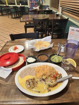 CHEESY POLLO $16.25. GUACAMOLE $6.50