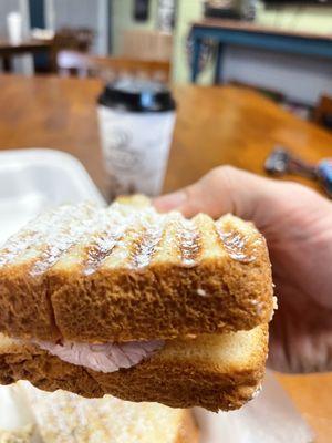 Delicious sandwich and cup of cappuccino