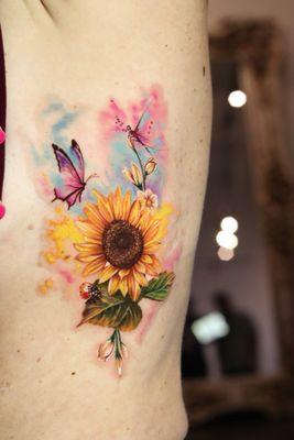 Watercolor tattoo with sunflower butterfly dragonfly and ladybug