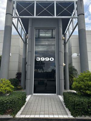 The entrance and elevator to their dental office