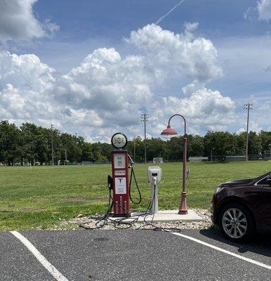 Tesla charging station in vintage gas pump.