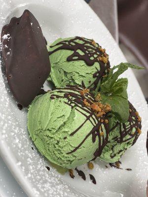 Housemade Mint Ice Cream  Chocolate Dipped Banana, Pistachio Crumbles and Chocolate Sauce