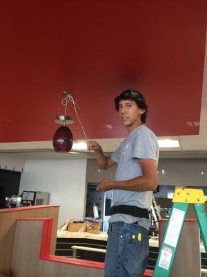 Taylor is installing lights in the recently built Busy Bee in Live Oak, FL.