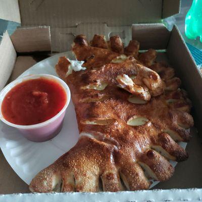 Cheese calzone, and their marinara compliments it perfectly.