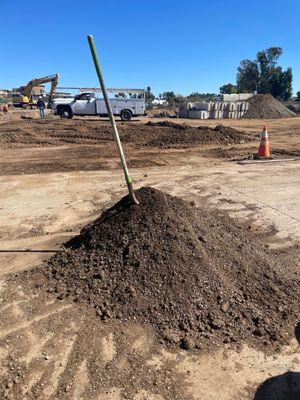 Our 1/2 yard of potting mixture. The shovel is theirs.