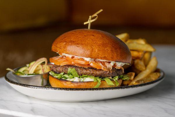 DEN BURGER - Nieman Ranch Burger Patty, Smoked Gouda, Caramelized Onion Aioli, Heirloom Tomatoes, Gem Lettuce & Rosemary Fries