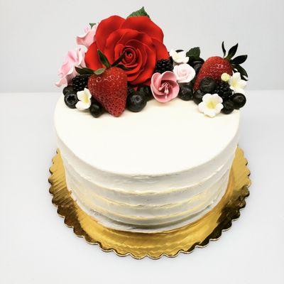 Our new 6" cheesecakes w/buttercream and handmade flowers and fresh fruit