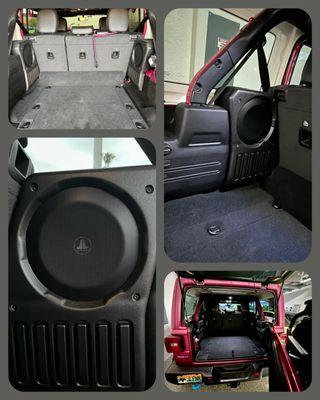 My 10" JL Audio subwoofers looking good in their Stealthboxes.  I love all the trunk space and the great sounding music.