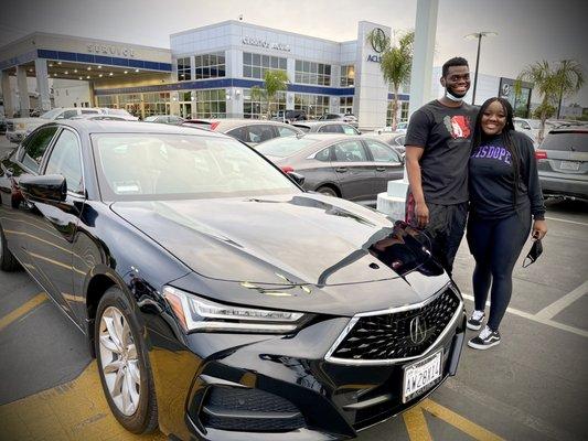 Me and my boyfriend with my new car. Thank you again Antonio