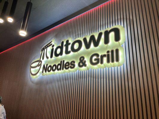 Interior signage at Midtown Noodles & Grill