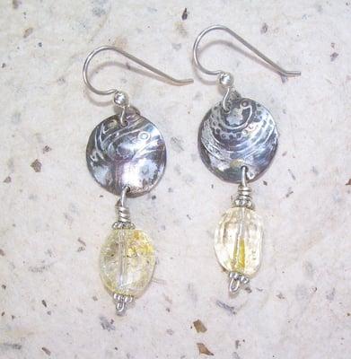 Embossed sterling silver with citrine, 60