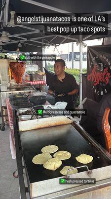 The whole spot with fresh tortillas getting grilled up.