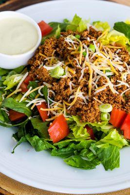 Taco Salad, ground turkey, romaine, tomatoes, cheese, green onions, avocado-lime dressing