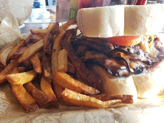 Tall boy beef n cheddar with fries and coleslaw on the side