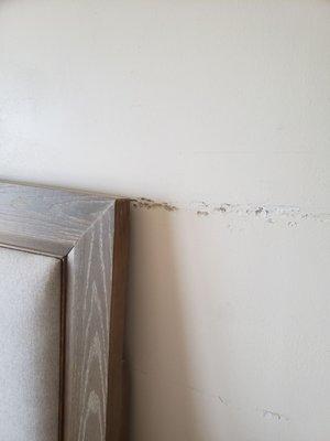 marks on the wall from the headboard