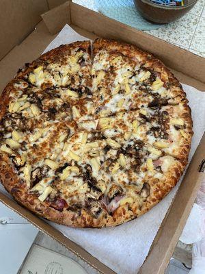 Hawaiian pizza with fresh mushrooms