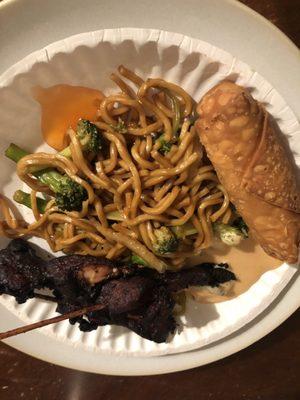 Smorgasbord of their veg lo mein, chicken skewers, and an egg roll