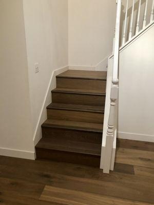 New wood floor in staircase, installed by Carpetworks