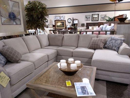 A nice neutral sectional to host all of your guests.