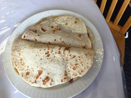 #6 and #7, baleadas sencilla ($2) and baleadas especiale ($2.50). The extra 50 cents for pork and avocado is worth it.