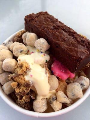 Cinnamon churro/cake batter with Reese's PB cups, frosted animal crackers, Butterfingers, cookie dough, & a brownie