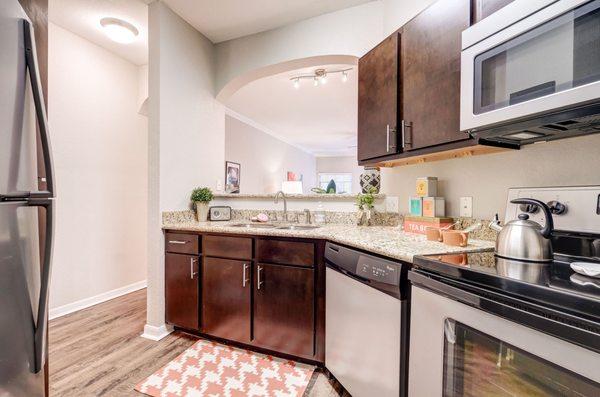 Open kitchen with stainless appliances