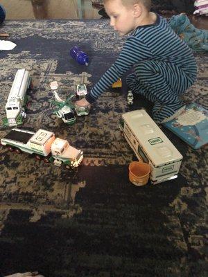 Just a boy loving his treasures that mama found at these neat store