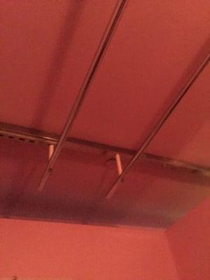 Bars on the ceiling for support when they walk on your back