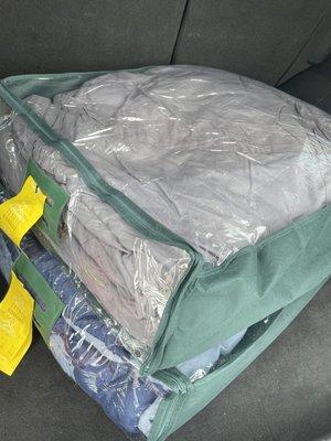 Comforters in storage bags